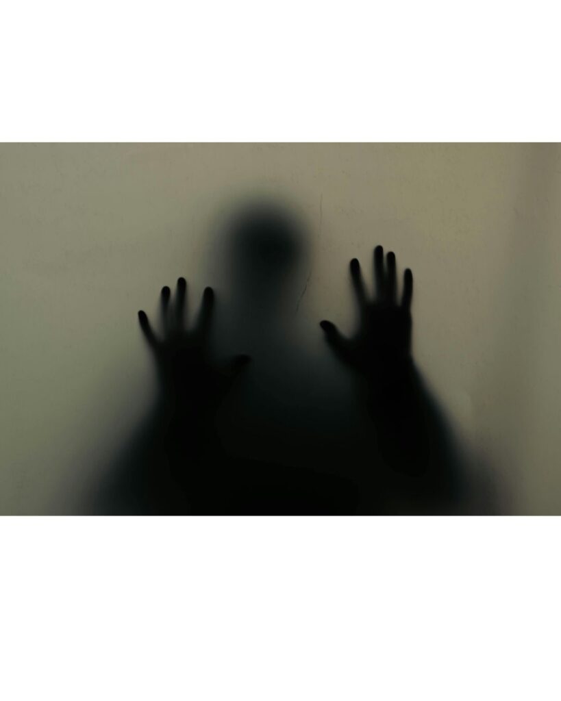 A Blurred Image Through Glass, Showing EMDR Can Help With Anxiety.