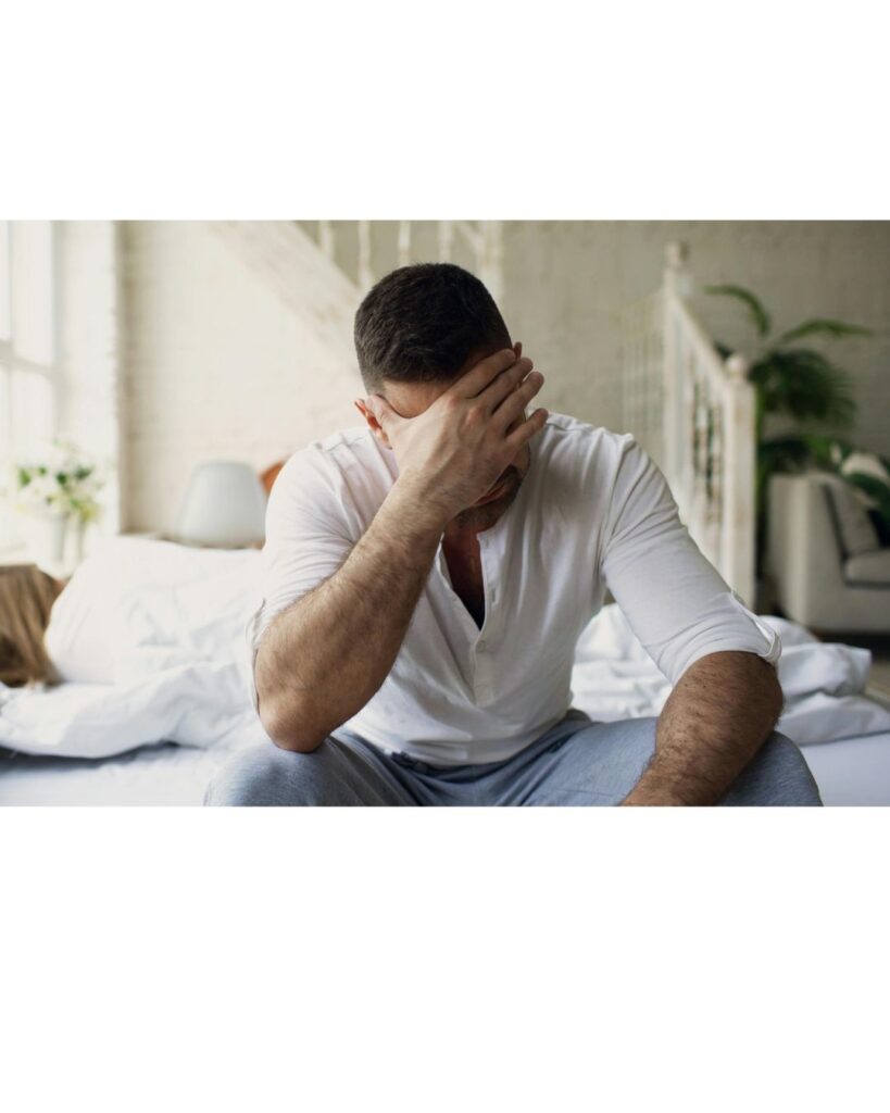 A male looking stressed and anxious, showing that hypnotherapy can help.