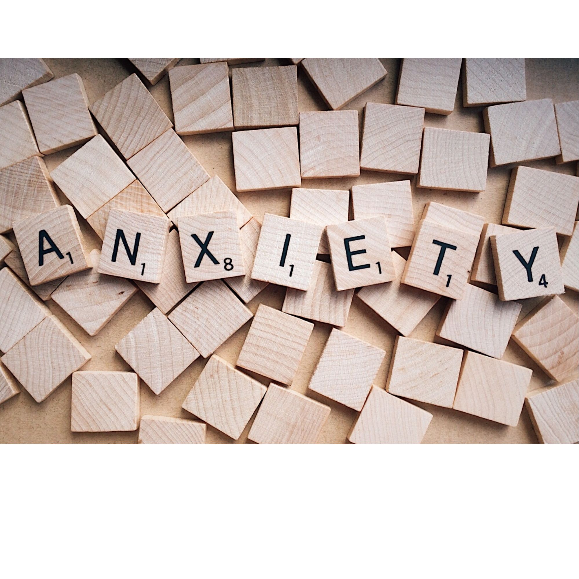 Anxiety word The word anxiety in scrabble letters, showing that hypnotherapy can help you with stress, anxiety and panic attacks.