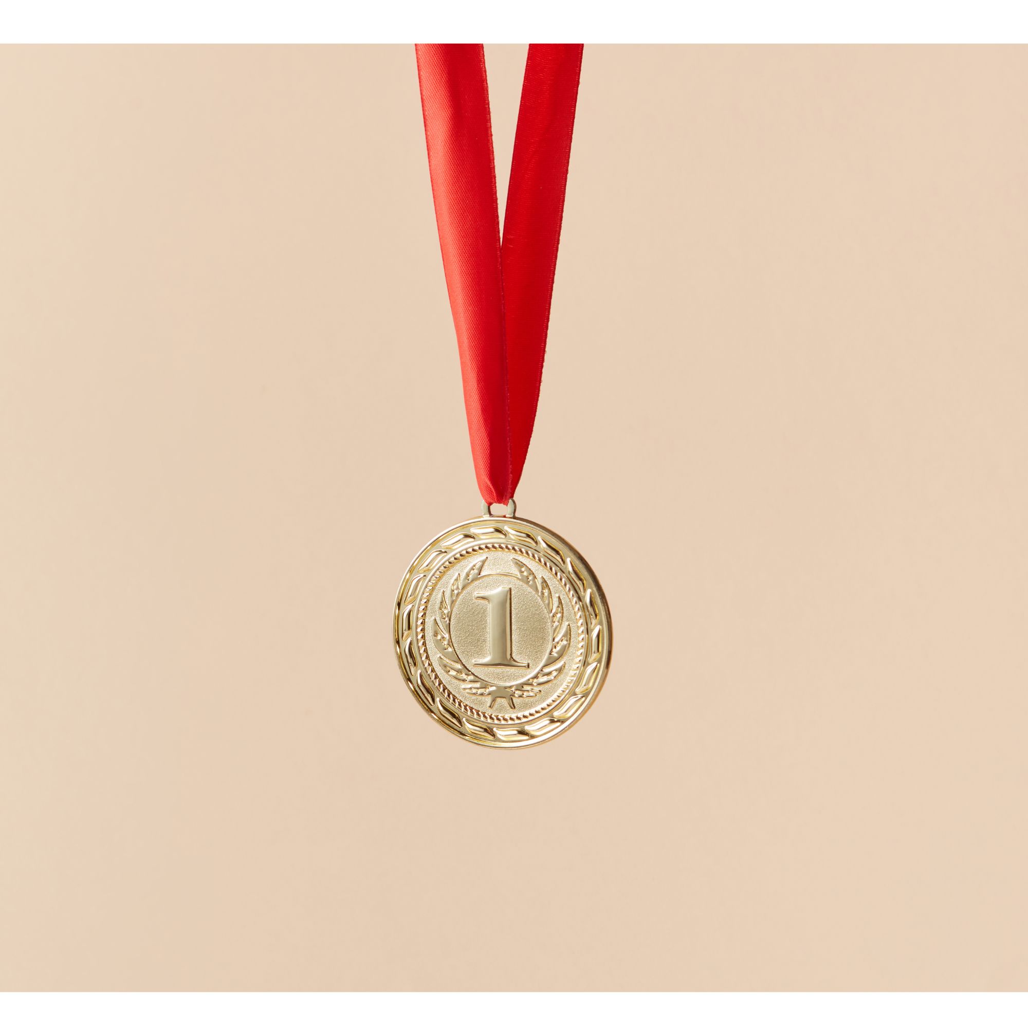 !st A picture of a gold medal with 1st on it, showing that hypnotherapy can help you win.