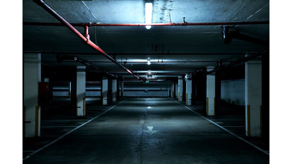 Picture of a low ceilinged, dark carpark showing that hypnotherapy can help with claustrophobia.